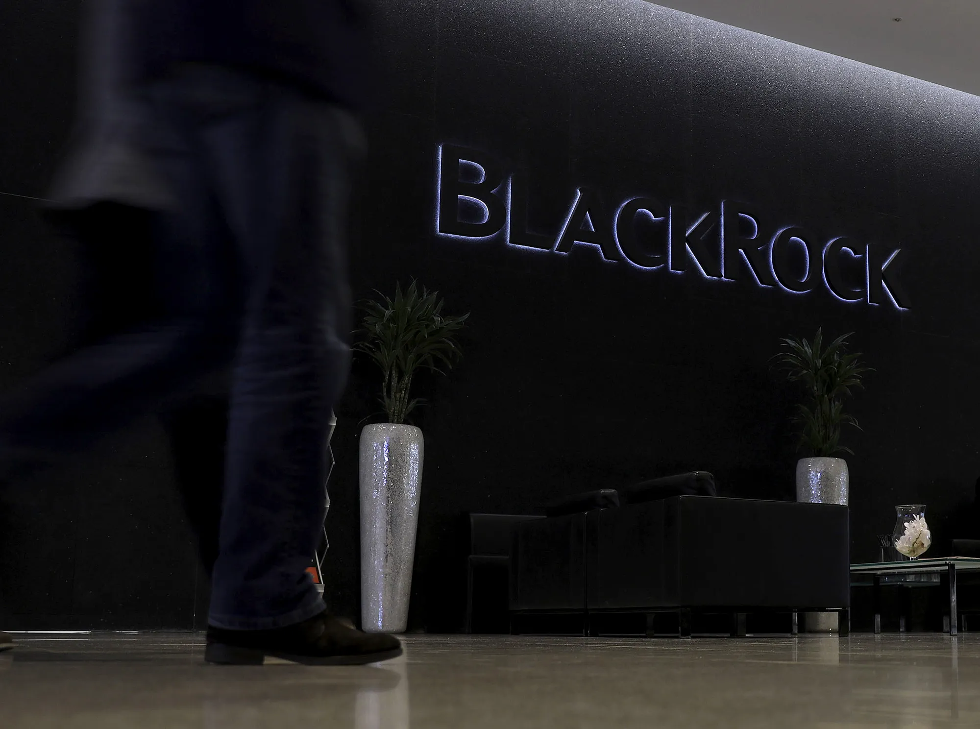 A logo sits on display in the atrium of the Blackrock Inc. offices in London.