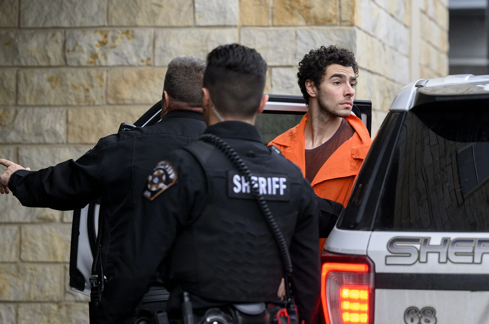 Luigi Mangione is led into the Blair County Courthouse for an extradition hearing in Hollidaysburg, Pennsylvania, on Dec. 10.