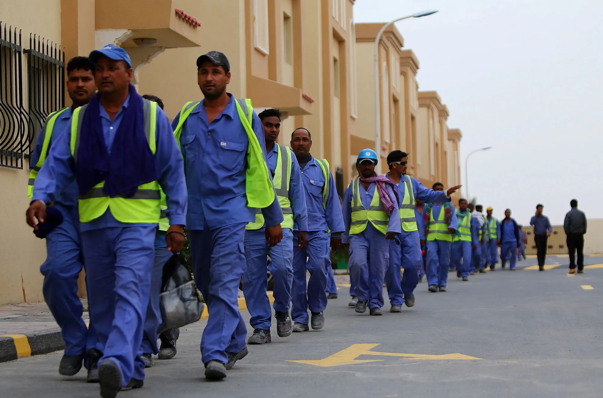 Foreign laborers working on the construction site of the al-Wakrah World Cup stadium.