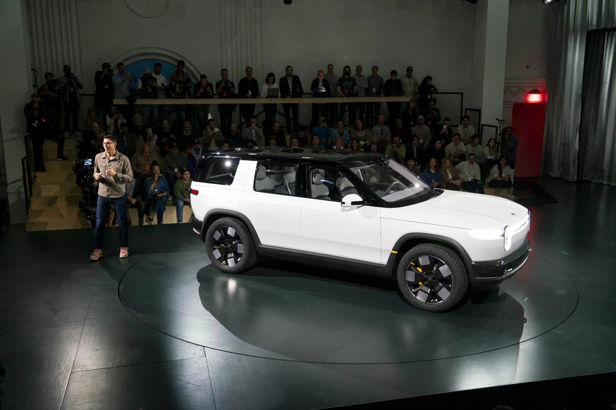 RJ Scaringe, chief executive officer and founder of Rivian Automotive Inc., unveils the Rivian R2 electric vehicle on March 7.