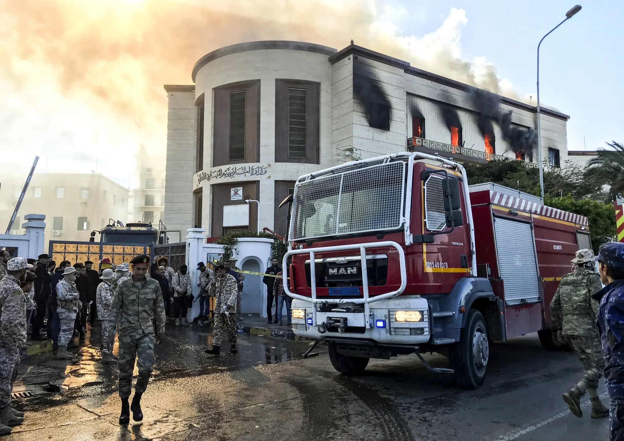 Smoke rises from the Libyan Foreign Ministry on Dec. 25.