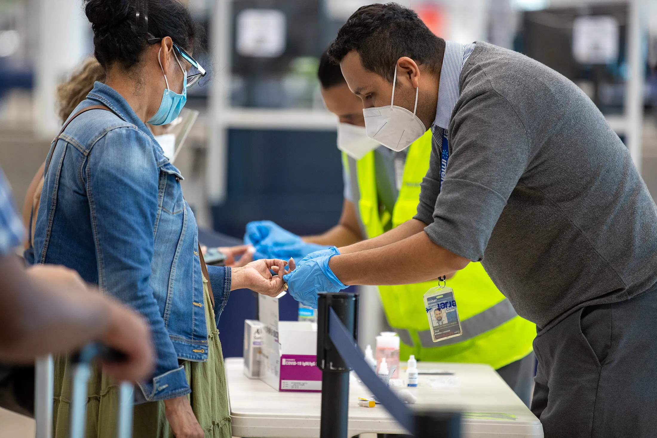 A traveler receives a Covid-19 rapid test at an airport Cancun International Airport in Cancun on Oct. 2, 2020.