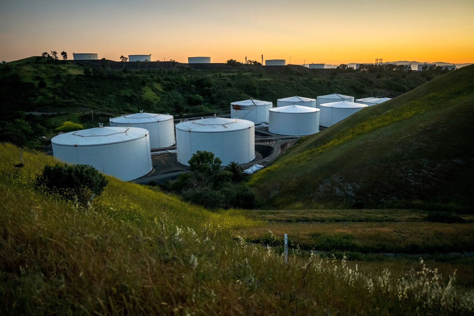 Fuel storage tanks containers stand at the NuStar Energy LP Selby Terminal in Crockett, California, U.S.