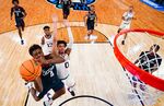 Nahiem Alleyne of the Connecticut Huskies goes to the basket against the Gonzaga Bulldogs during the 2023 NCAA Men's Basketball Tournament in Las Vegas, Nevada on March 25.