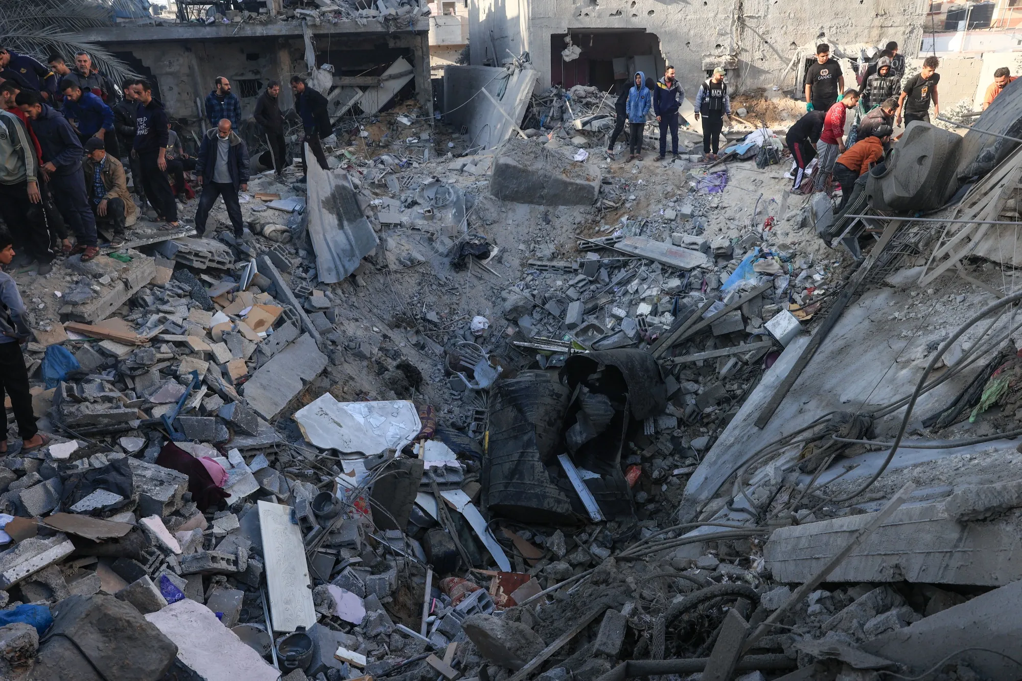 A crater among destroyed buildings in the aftermath of an overnight bombing in Rafah, on Dec.&nbsp;3.