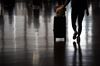 A traveler walks in a departure hall at Narita Airport in Narita, Chiba Prefecture, Japan, on Monday, Aug. 26, 2019. The decline in South Korean tourists in July dented an otherwise positive result, with the total number of visitors to Japan climbing 5.6% from a year earlier.