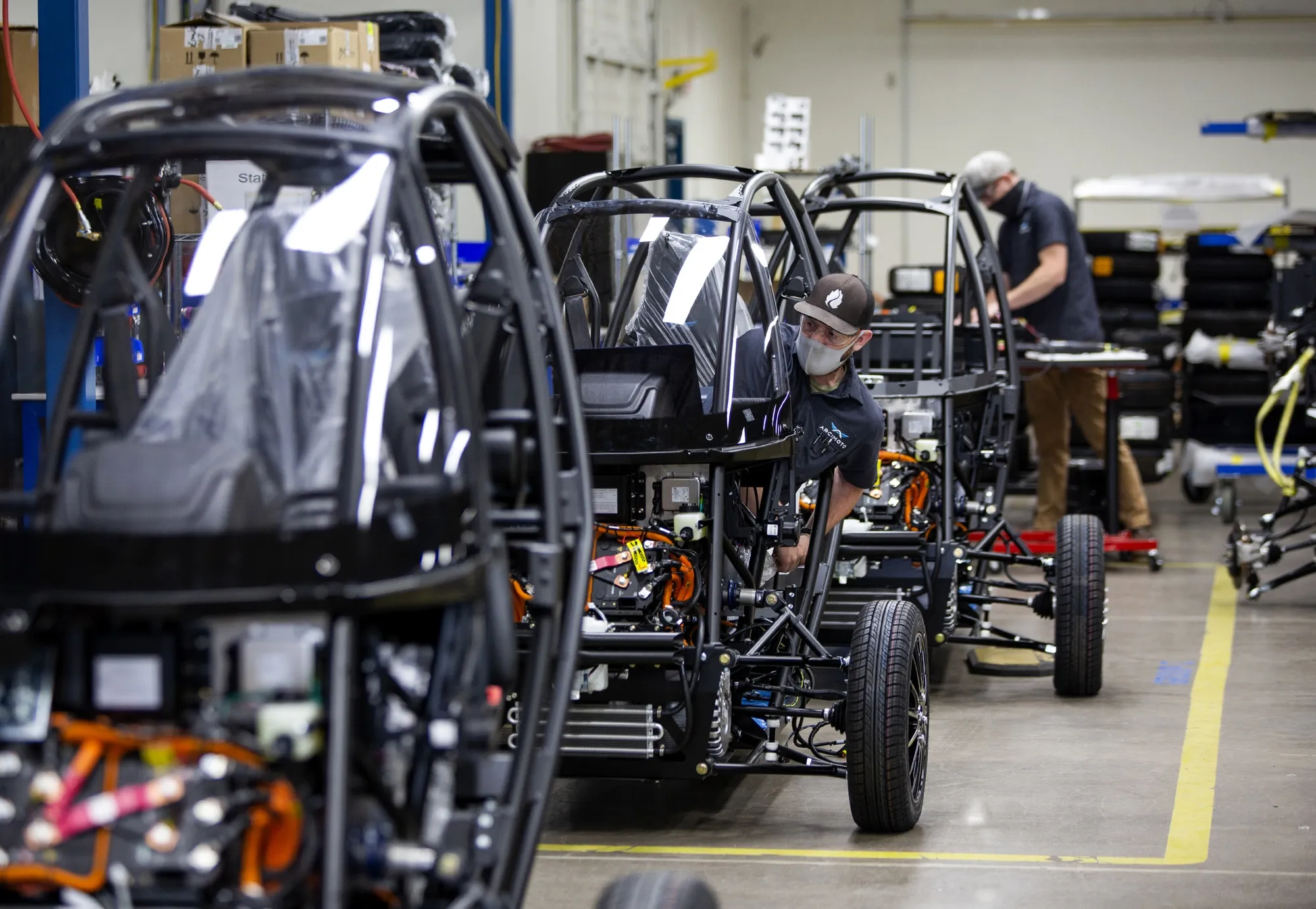 A worker at the Arcimoto manufacturing facility in Eugene, Oregon.