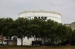 The BASF SE logo sits on a storage silo at the company's chemical plant on the River Rhine in Ludwigshafen, Germany, on Thursday, Aug. 13, 2020. 
