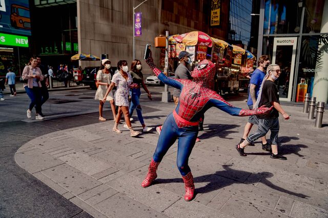 Spiderman costumed character taking photos with people in Times Square on September 4, 2021