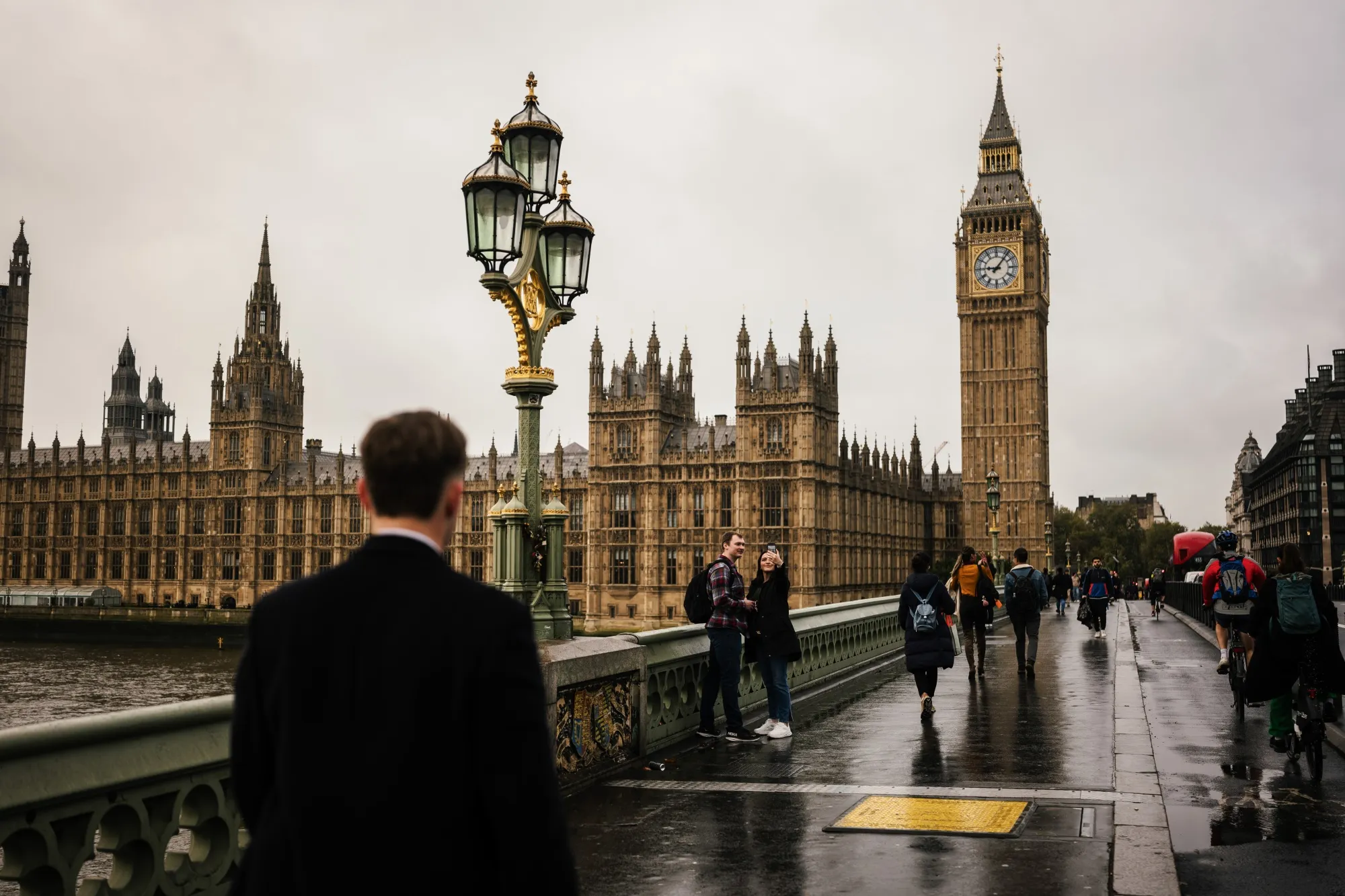 Commuters cross Westminster Bridge in London, UK.