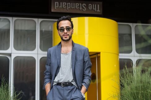 Moti stops by a presentation at the Standard, High Line in a high-waisted suit and tank by Todd Snyder, whose show he attended earlier in the day.