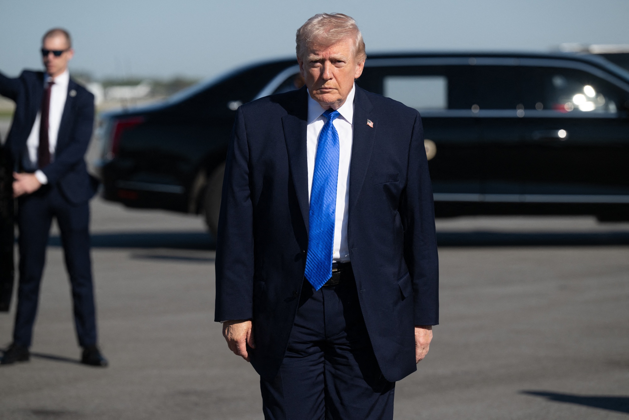US President Donald Trump prior to boarding Air Force One at Palm Beach International Airport in West Palm Beach, Florida, on March 23. Photographer: Saul Loeb/AFP/Getty Images