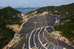 Solar panels at a solar plant in this aerial photograph taken above Geogeum Island in Goheung, South Korea.