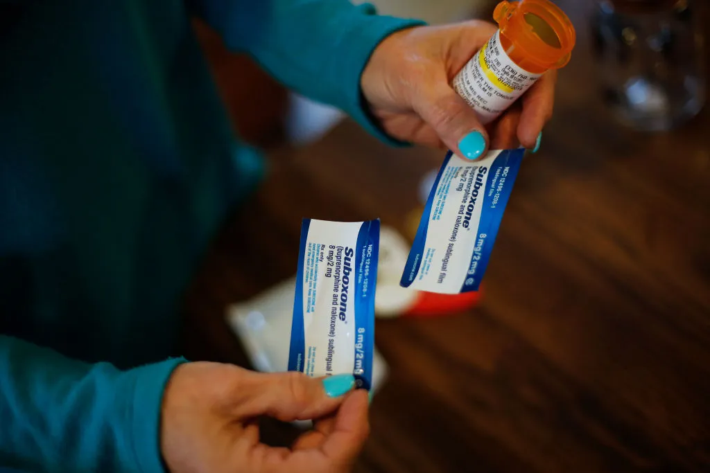 A person holds a prescription for Suboxone at her home in Lewisville, N.C., on March 11.&nbsp; &nbsp;&nbsp;