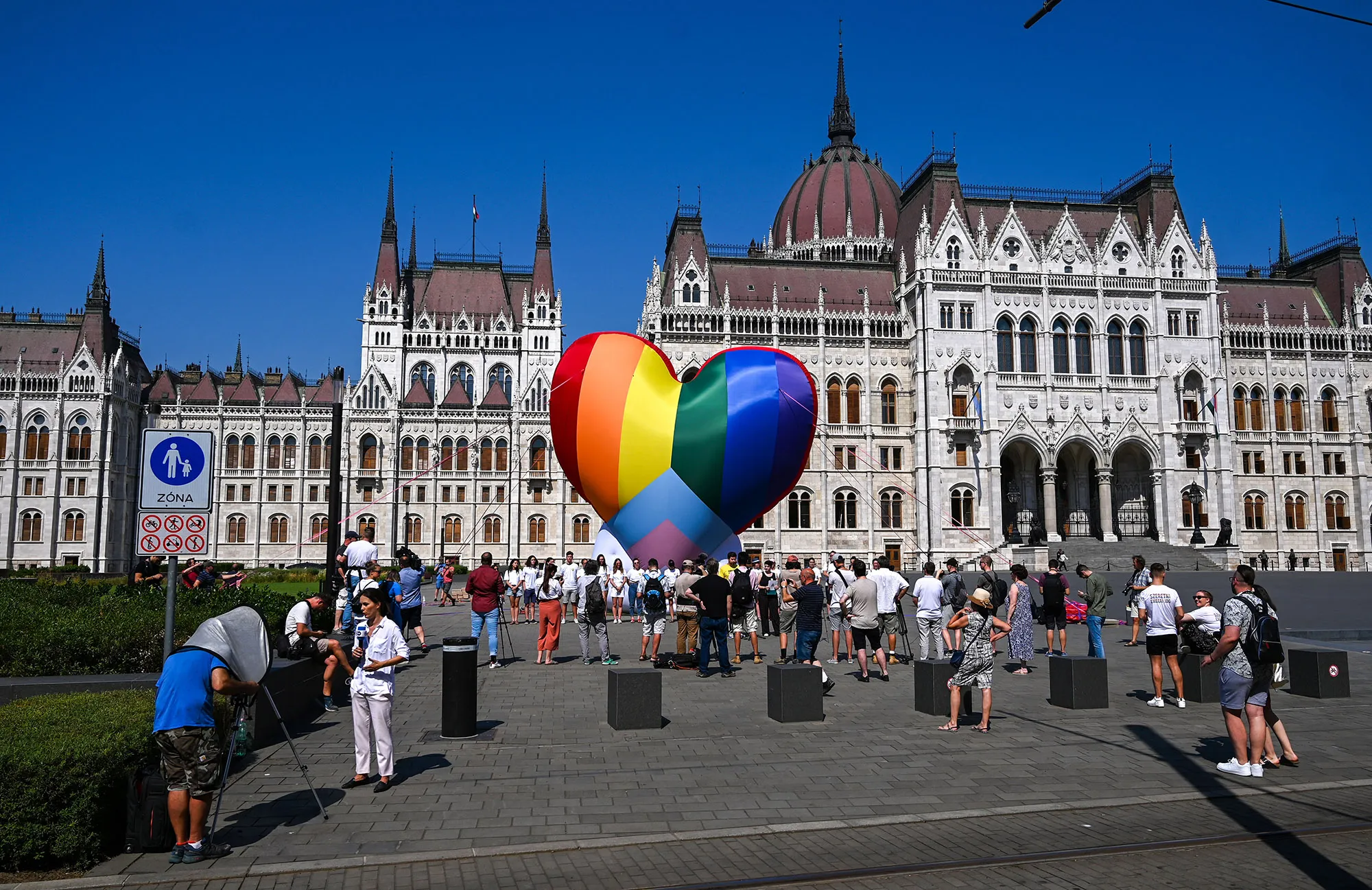 Activists protest the crackdown on LGBTQ rights&nbsp;in front of the parliament in Budapest on July 8.