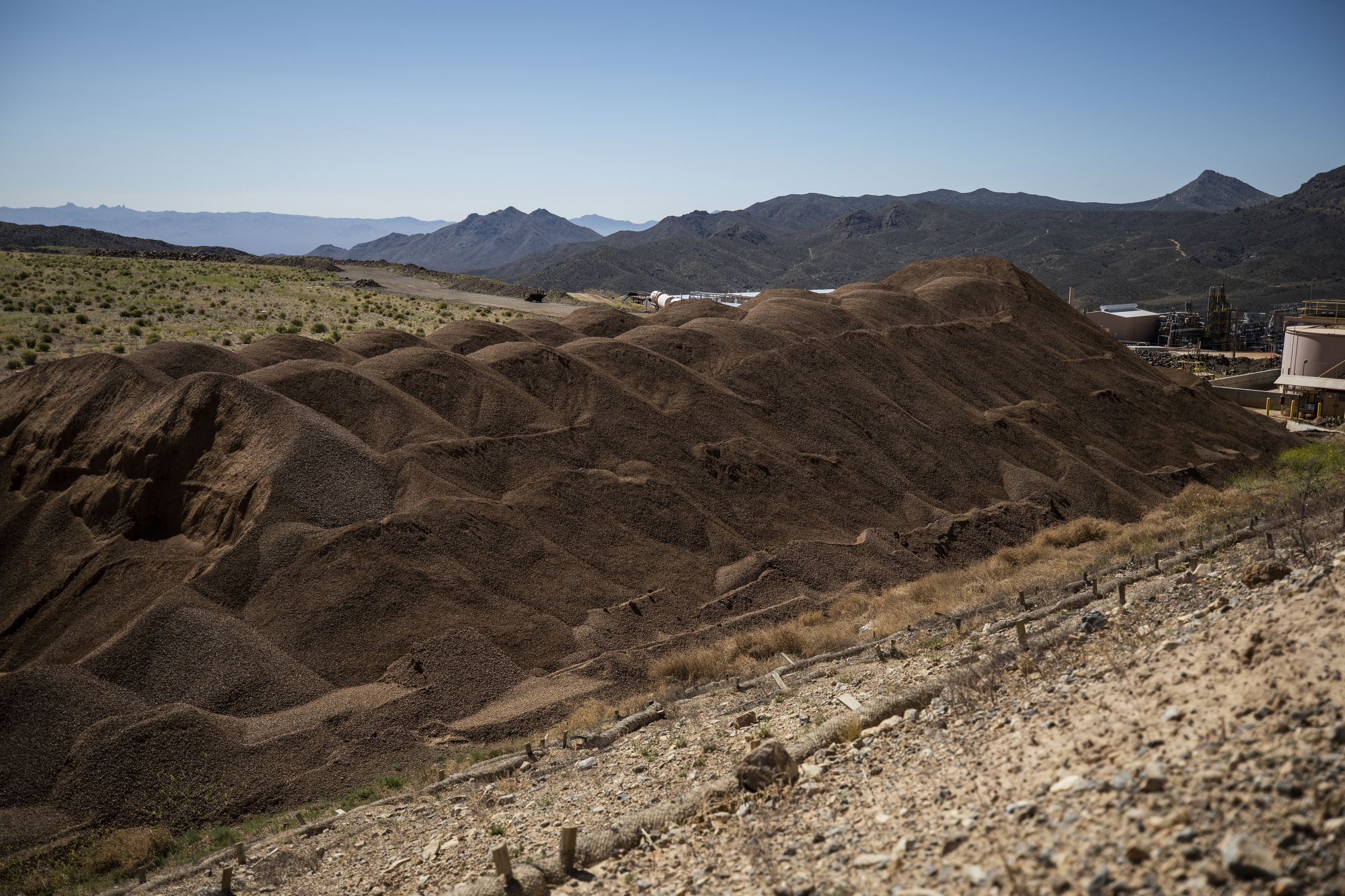 Piles of crushed ore sit at the Mountain Pass mine, operated by MP Materials, in Mountain Pass, California.