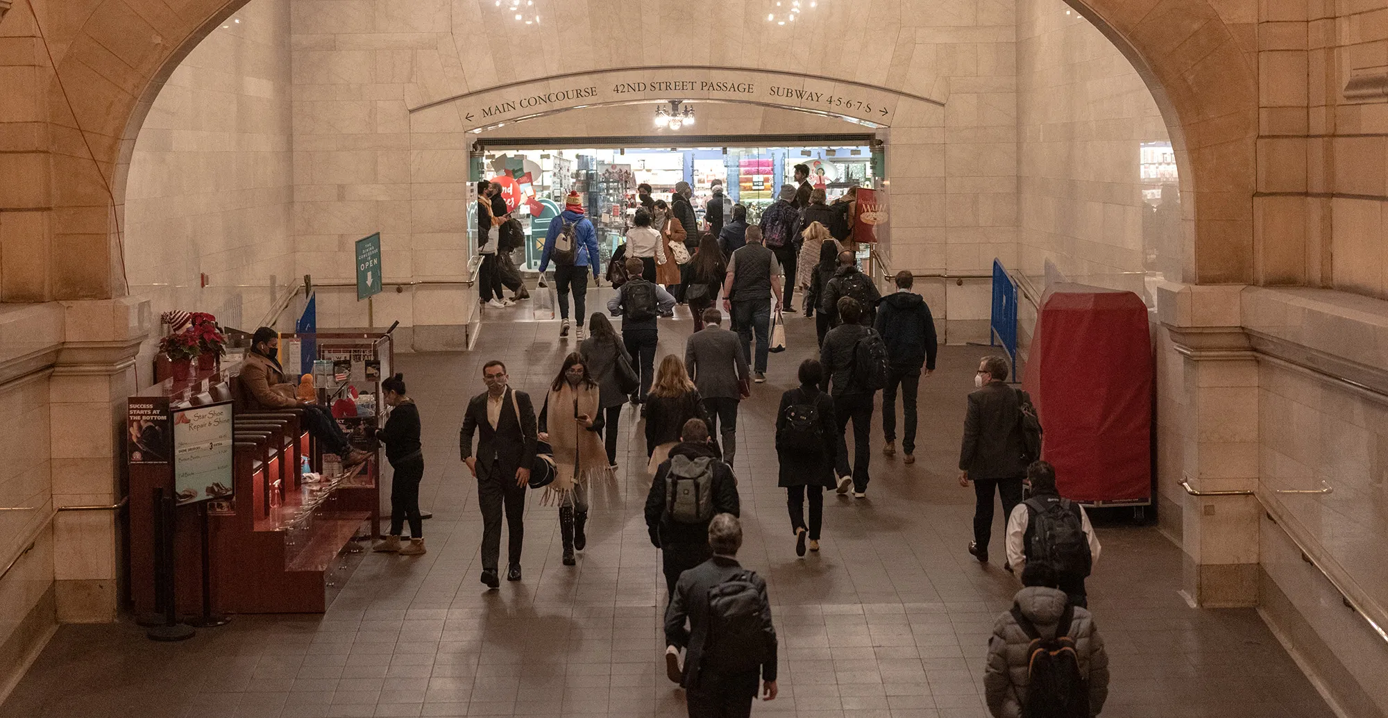Commuters walk through Grand Central station during morning rush hour in New York.