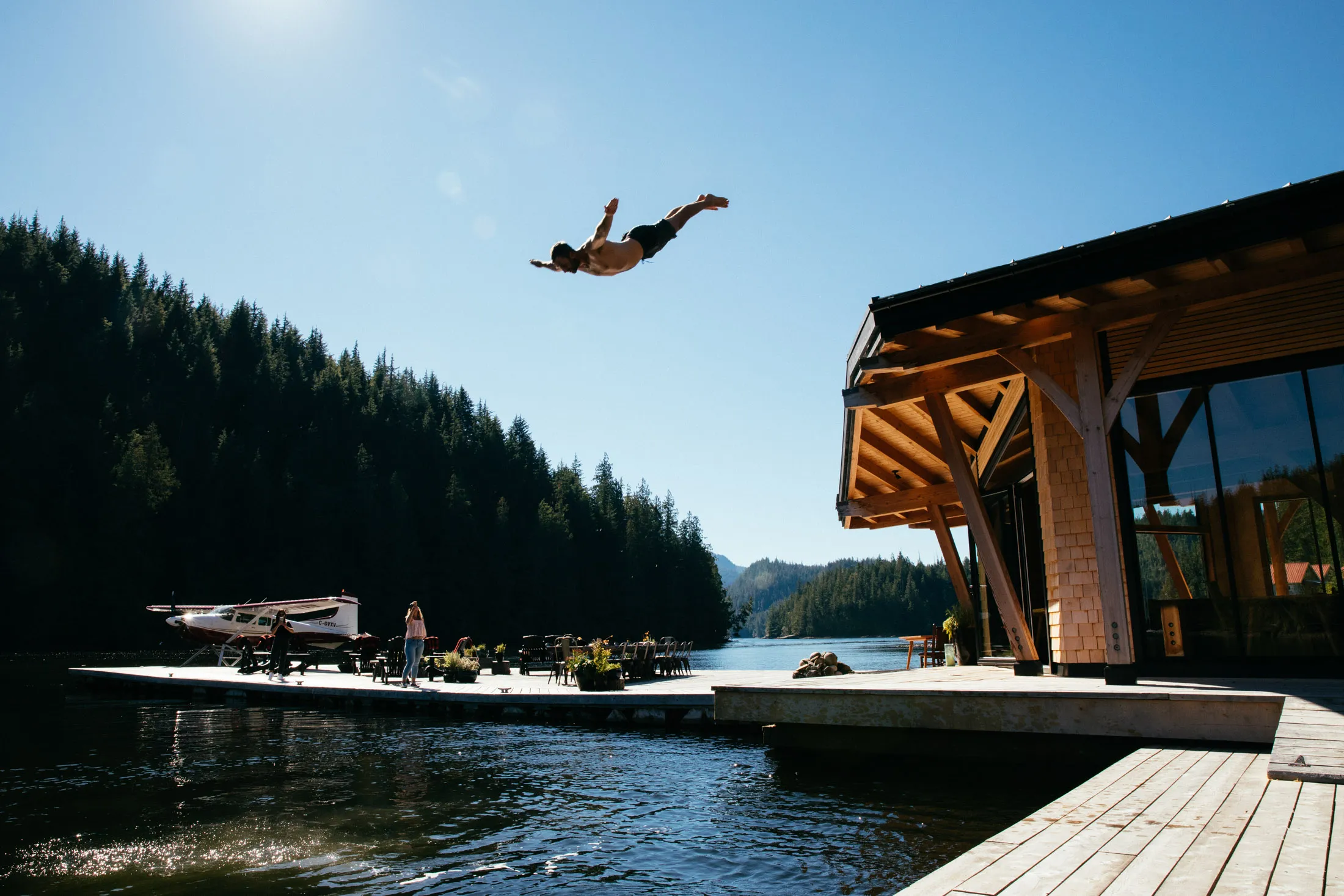Will Haven, a Nimmo Bay Resort guide, takes a dive.