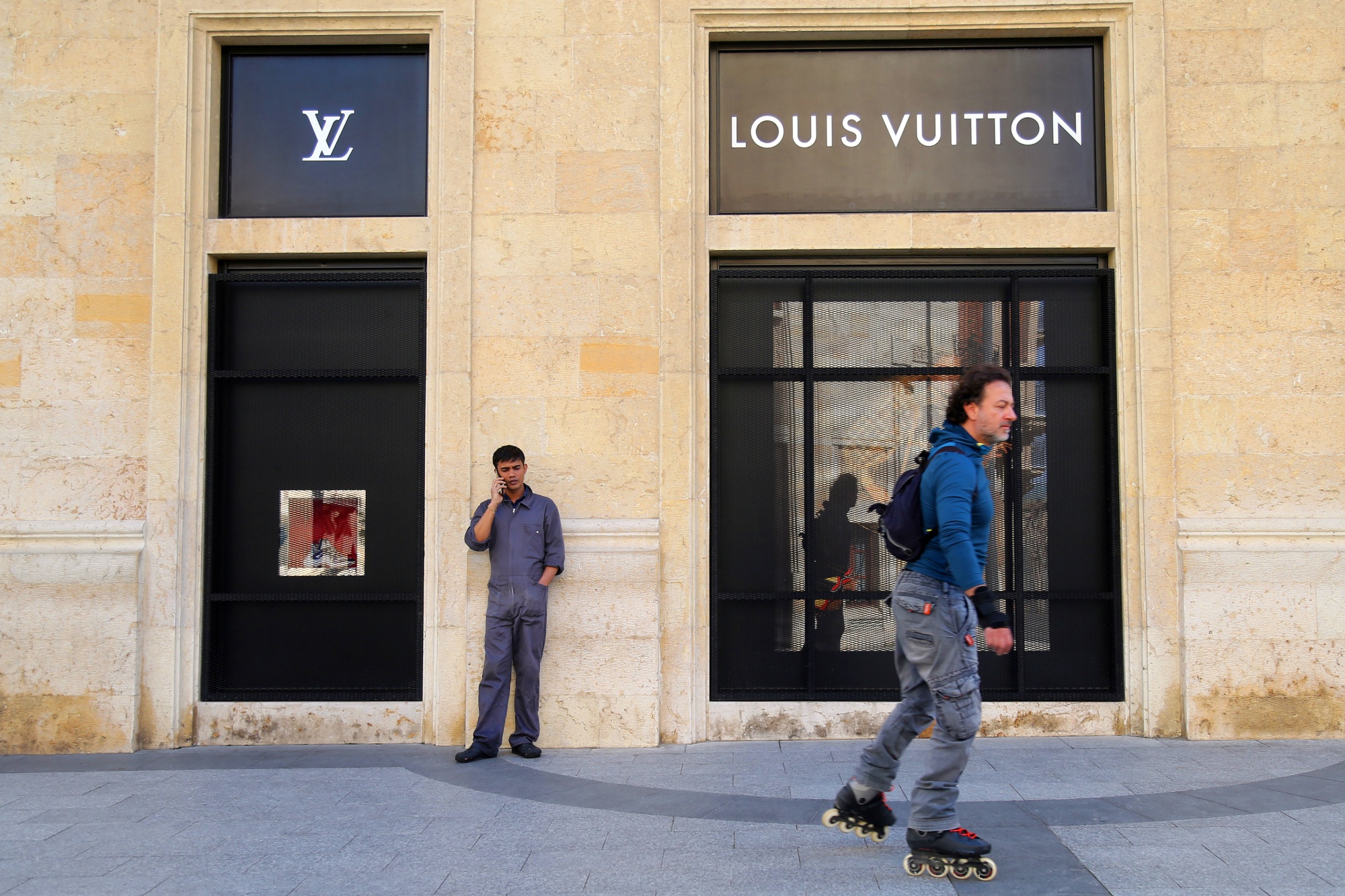 Drive, skate, vote: Vuitton closes Paris Fashion Week with slogans