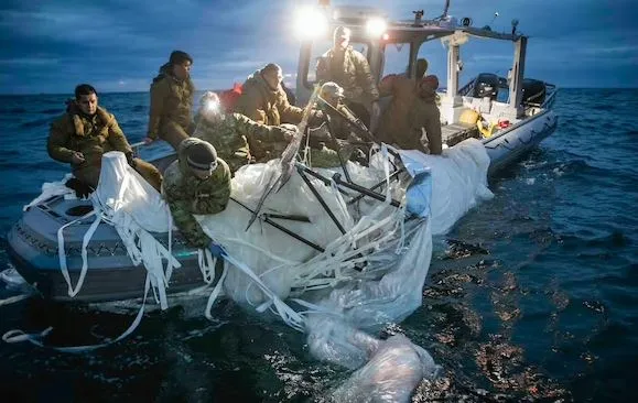 Sailors recover a surveillance balloon off the coast of Myrtle Beach, South Carolina, in February.