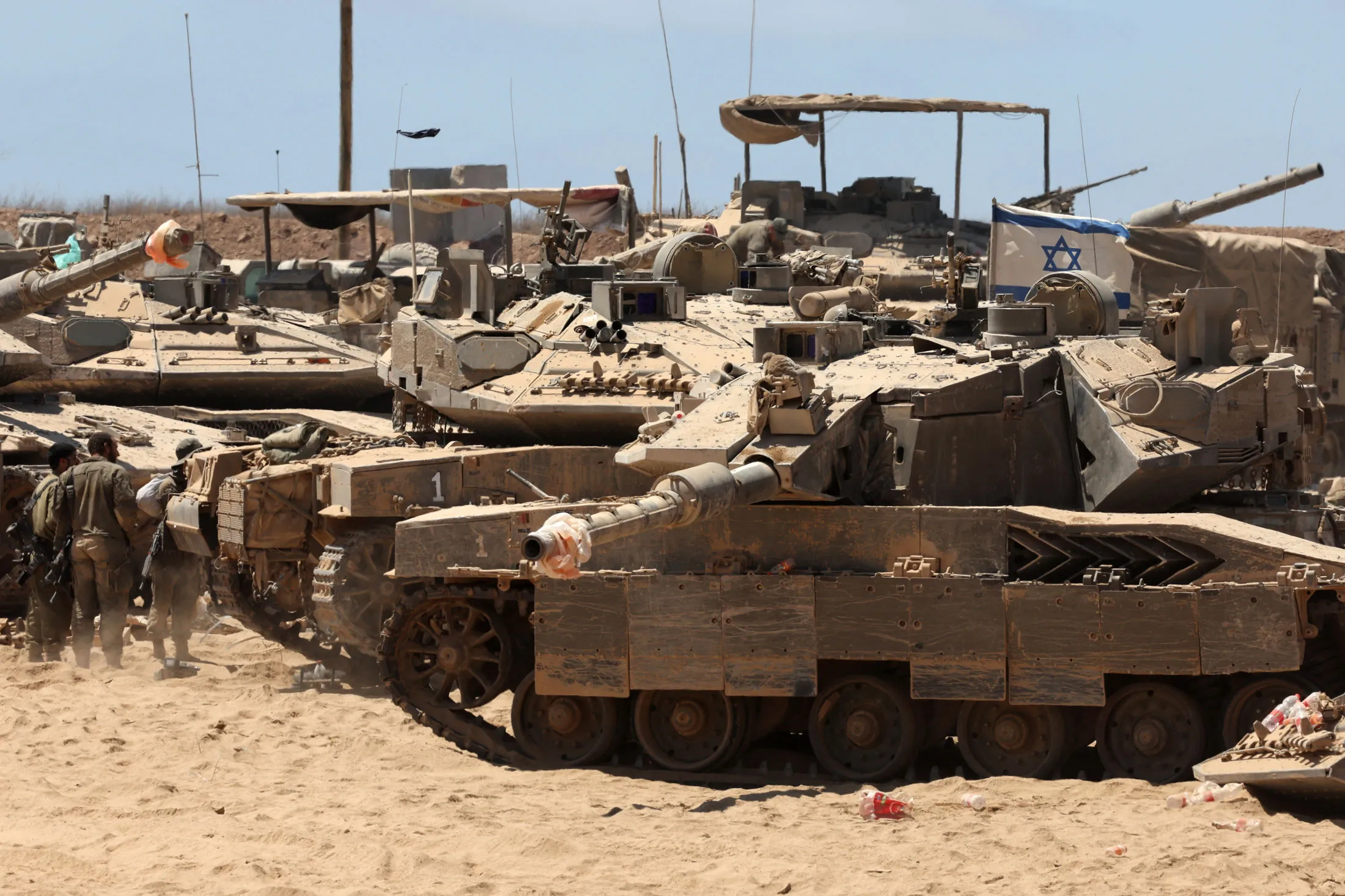 Israeli soldiers and tanks near the border with Gaza.