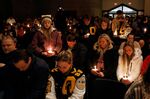A vigil is held after the shooting at Oxford High School at Lake Pointe Community Church in Lake Orion, Michigan, on Nov. 30.