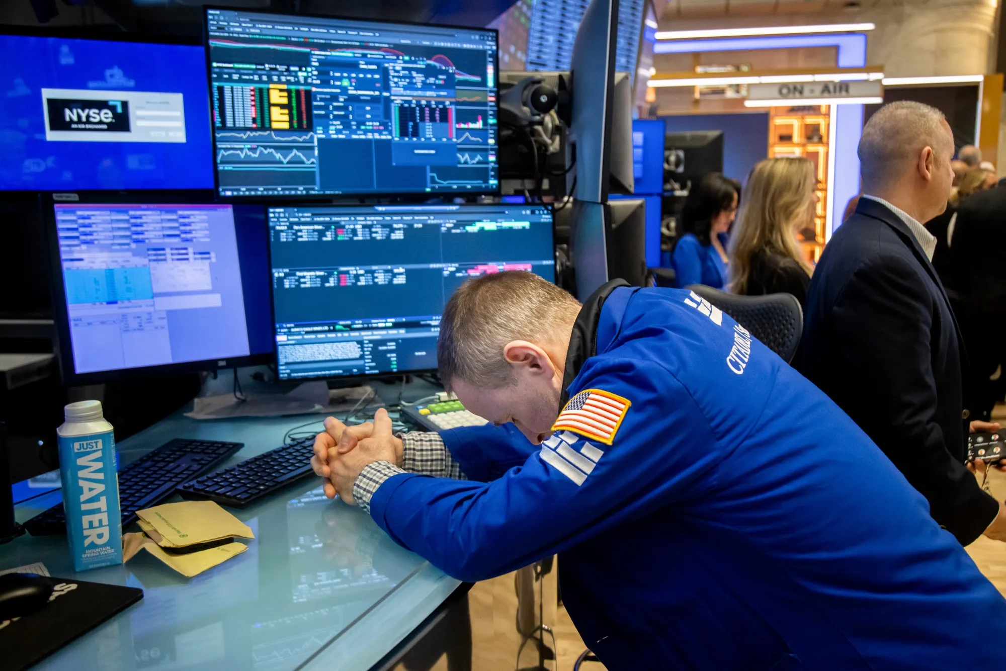 Traders work on the floor of the New York Stock Exchange.