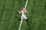 Stetson Bennett throws the ball in the fourth quarter of the game against the Alabama Crimson Tide on Jan. 10.