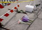 Flowers are laid near the scene of a shooting at a Fourth of July parade in Highland Park, Illinois, on July 5. 
