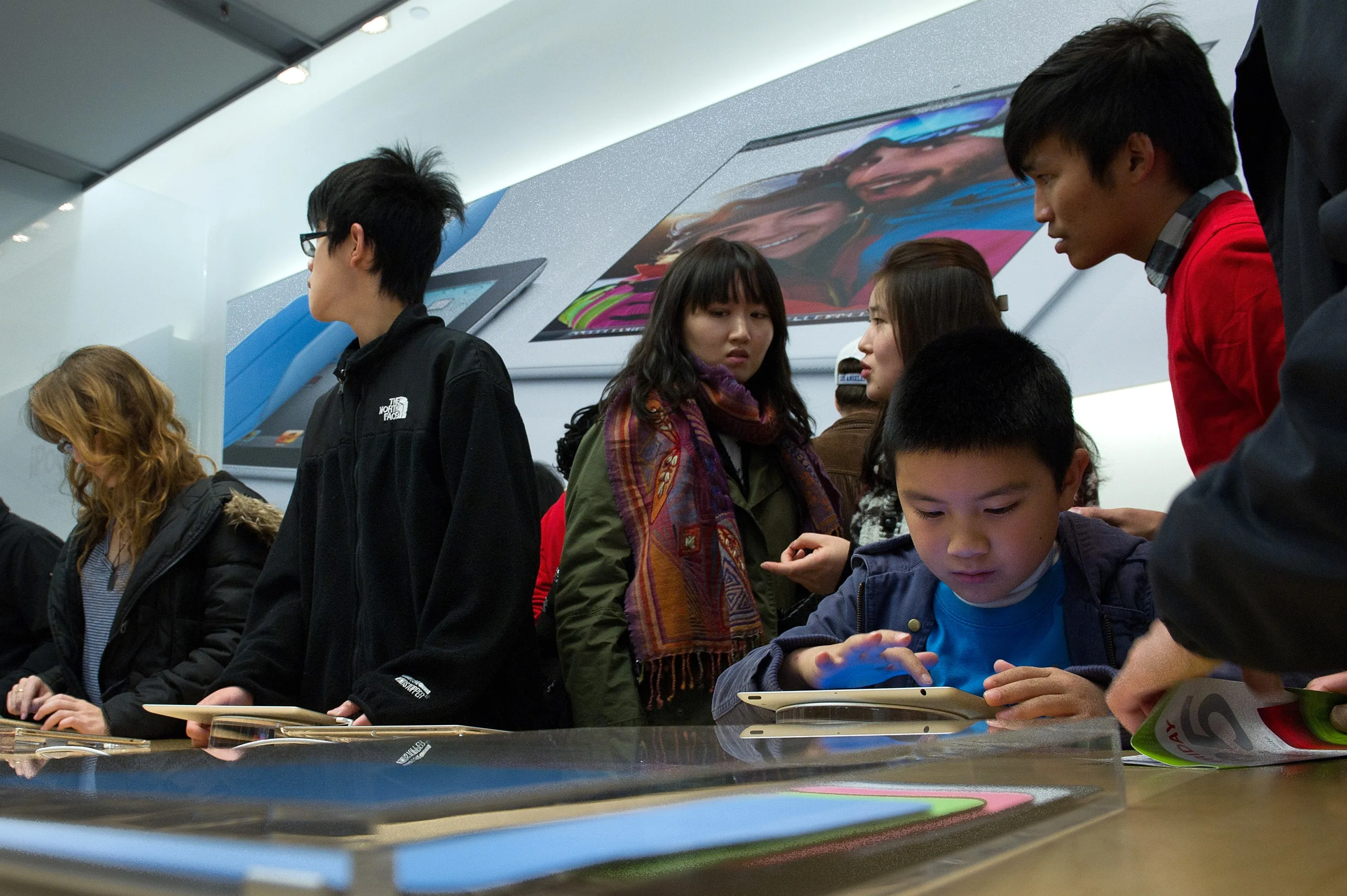 Customers at an Apple store in San Francisco.
