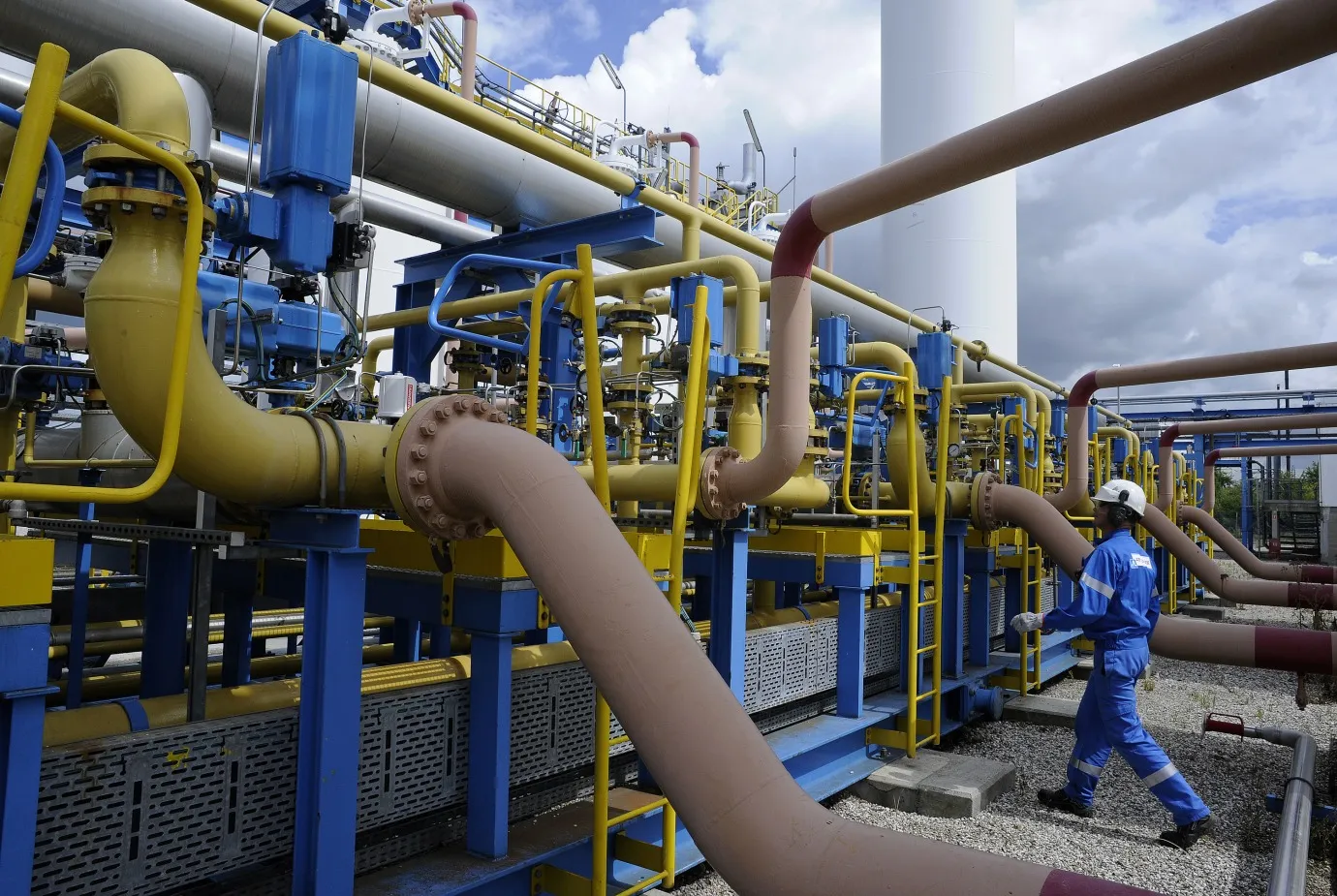 An employee works at the Air Liquide hydrogen plant in Port Jerome, France, on Friday, July 24, 2009. The company announces its earnings next week.