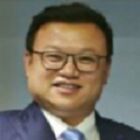 Headshot of Dr Jinyi Guo