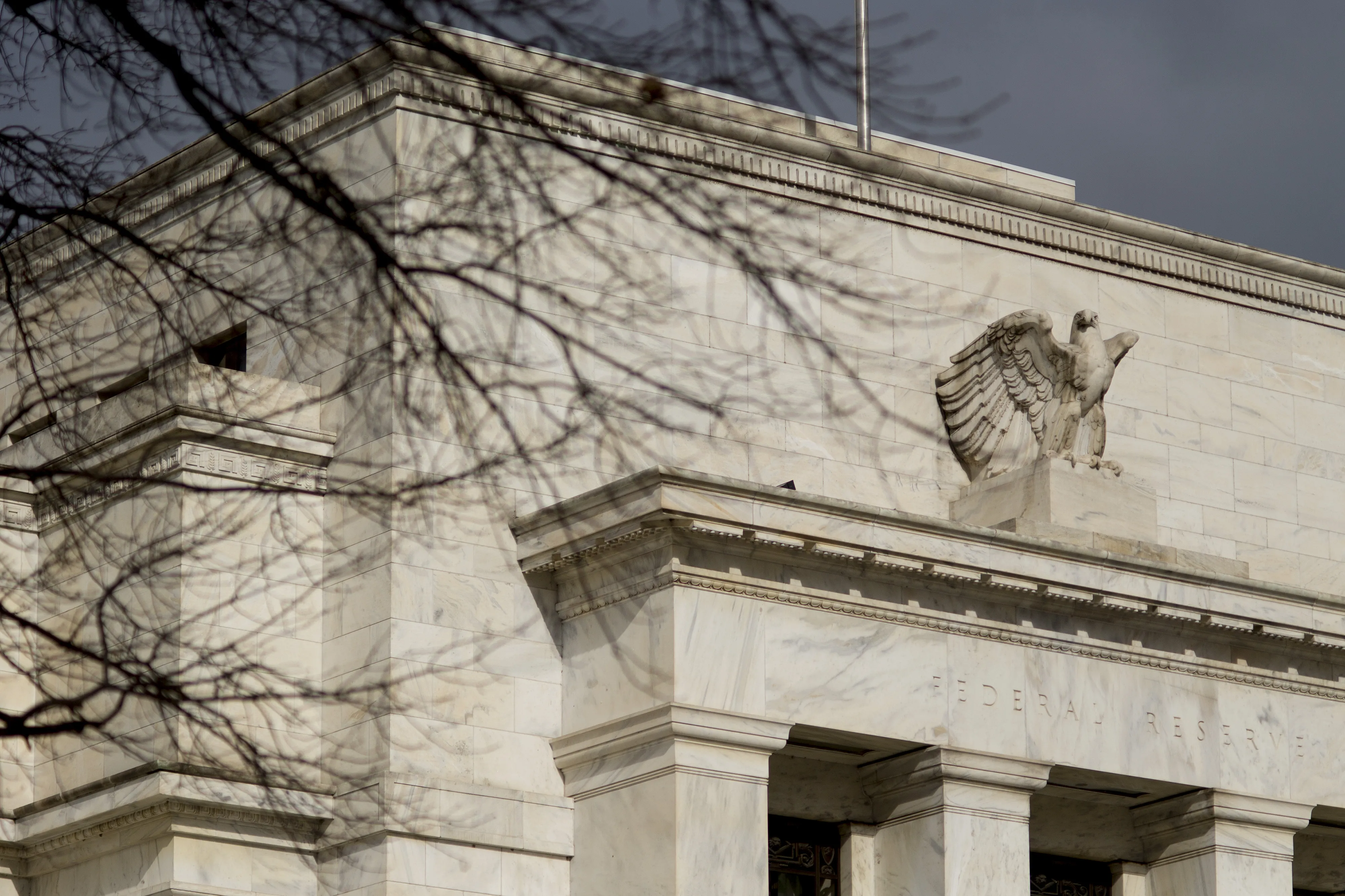 The Marriner S. Eccles Federal Reserve building stands in Washington, D.C., U.S., on Tuesday, Jan. 27, 2015. The policy-setting Federal Open Market Committee (FOMC), meeting for the first time in 2015 on Tuesday and Wednesday in Washington, will be challenged by reports contrasting the encouraging performance of the U.S. economy with a global outlook that has darkened since they met in December.
