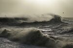Waves crash against the Cobb in Lyme Regis, west Dorset, as Storm Eunice hits the south coast on Feb.&nbsp;18, 2022.