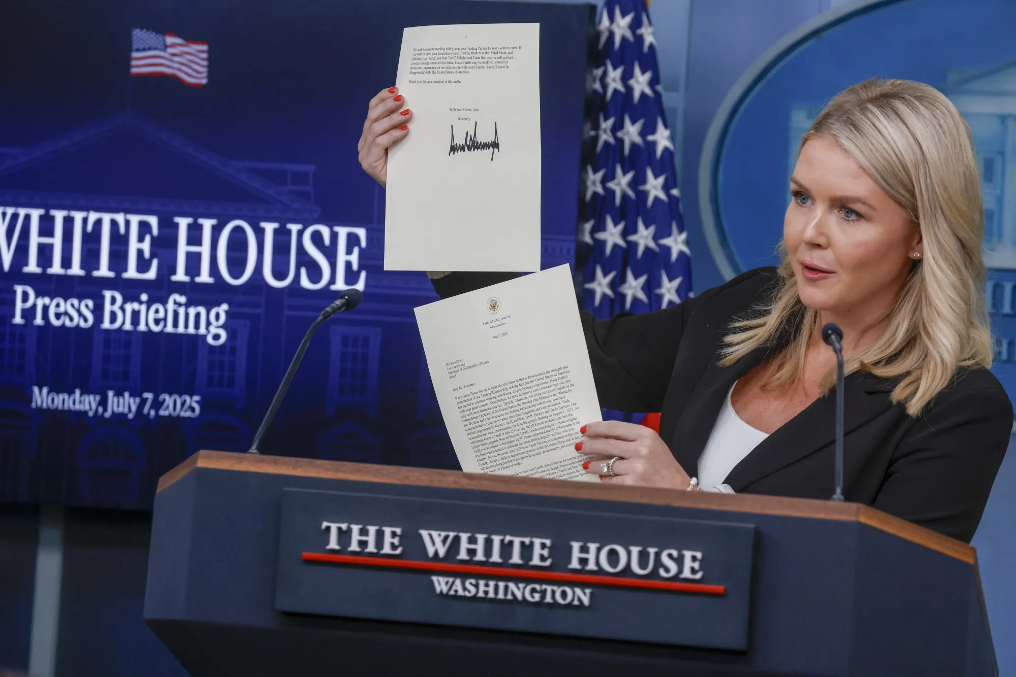 White House Press Secretary Karoline Leavitt holds a letter from President Donald Trump addressed to South Korean President Lee Jae-Myung.&nbsp;