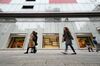 Pedestrians walk past a Fendi SpA store in the Ginza area in Tokyo, Japan.