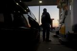 Gas Stations As Global Oil Price War Stings Even Small Towns Across America
