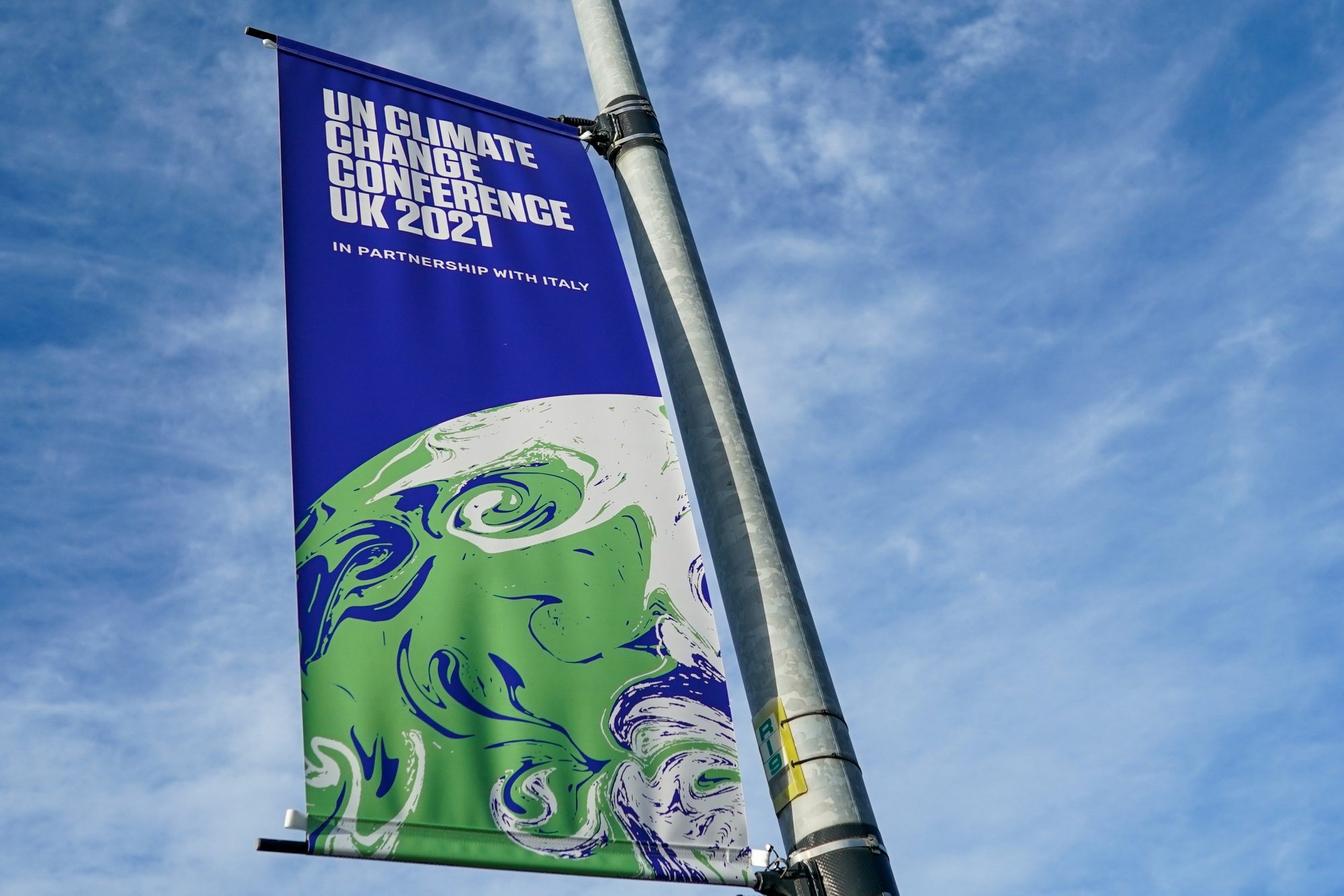 A banner advertisings the upcoming COP26 climate talks in Glasgow.