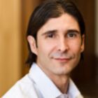 Headshot of Simon Rothman