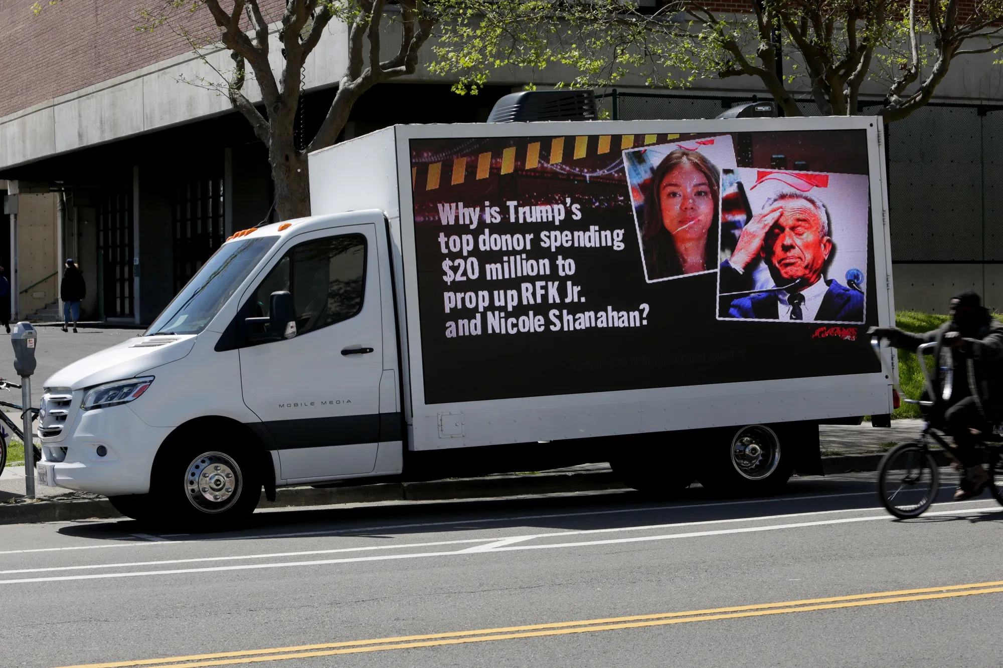 Democratic National Committee Truck Outside The Robert F. Kennedy Jr. Vice Presidential Runnng Mate Announcement Calls Attention To Republican Funding Of RFK Jr. Presidential Campaign