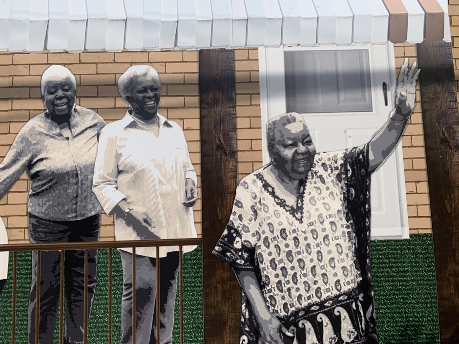 “The Anchors” is on the exterior of the community space, The Corner, and it honors the elders on the Hill who have held the neighborhood together.