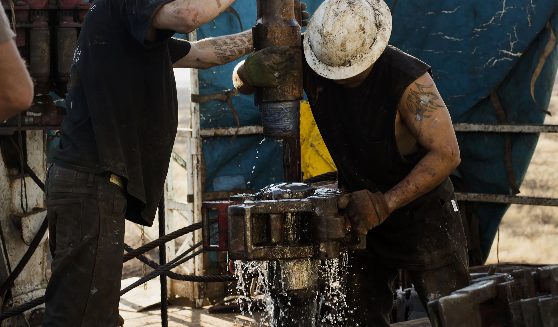 Workers on a rig at the Permian basin outside of Midland, Texas.
