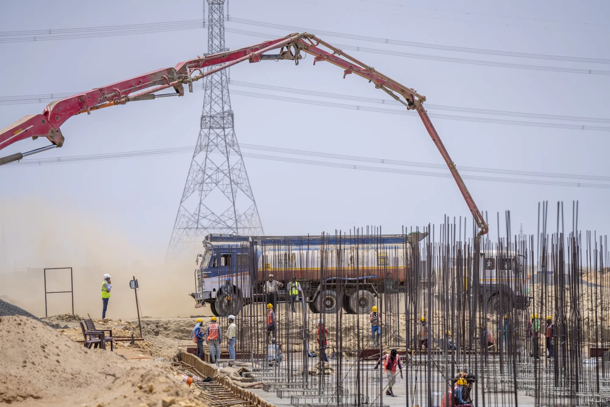 Construction at the development site of Adani Green Energy Ltd. renewable energy park in Gujarat, India.