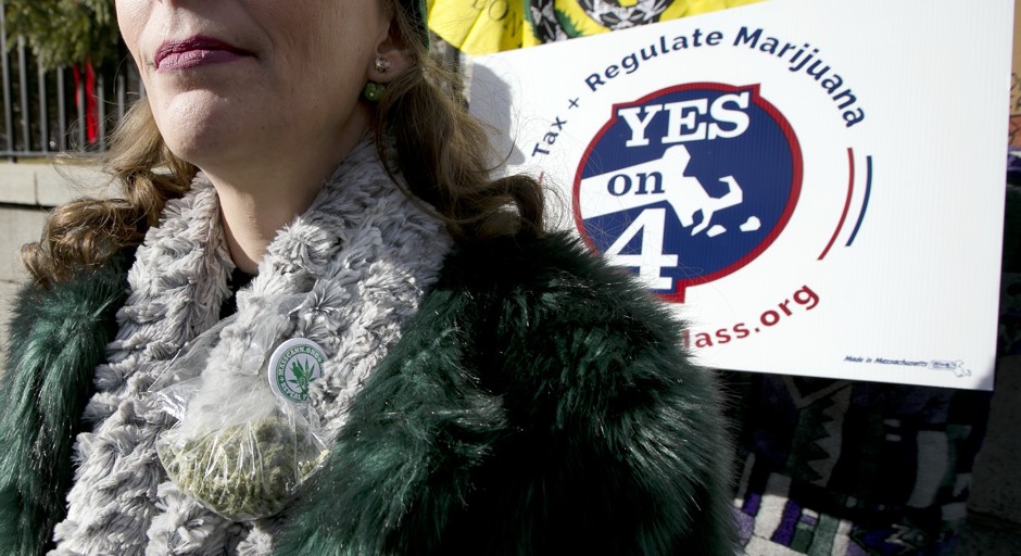 A woman attends a rally in front of the Massachusetts State House in Boston in December 2016, objecting to delay in opening retail marijuana stores.