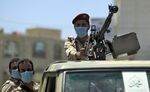 Soldiers in the back of a pickup truck during a patrol in Sana’a on March 23.