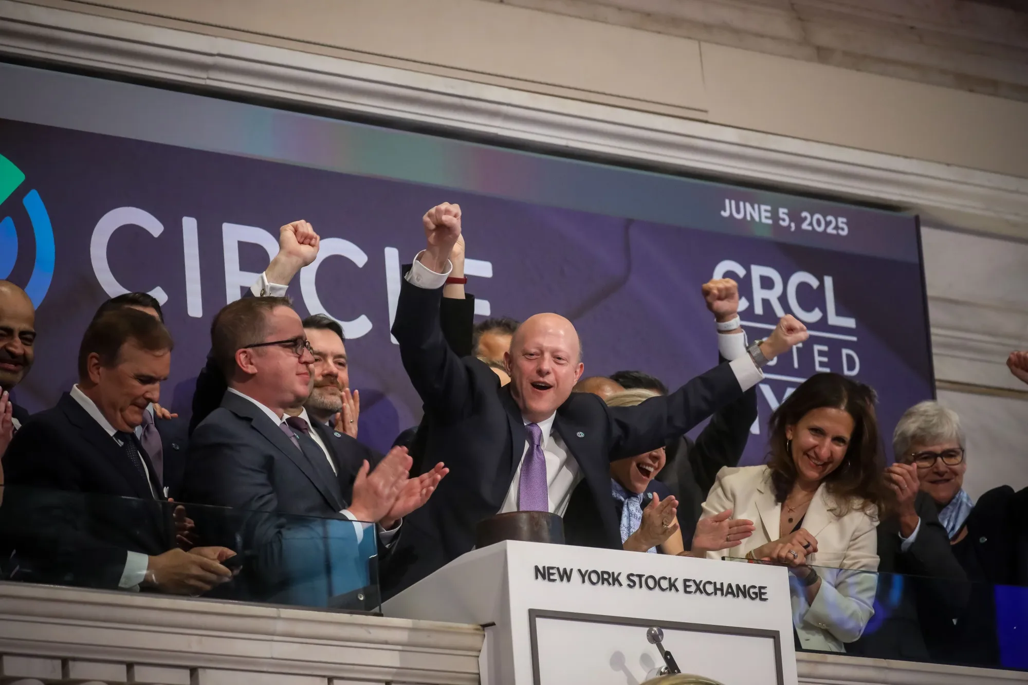 CEO of Circle Internet Financial&nbsp; Jeremy Allaire,&nbsp;center, rings the opening bell on the floor of the New York Stock Exchange during the Circle IPO on June 5.