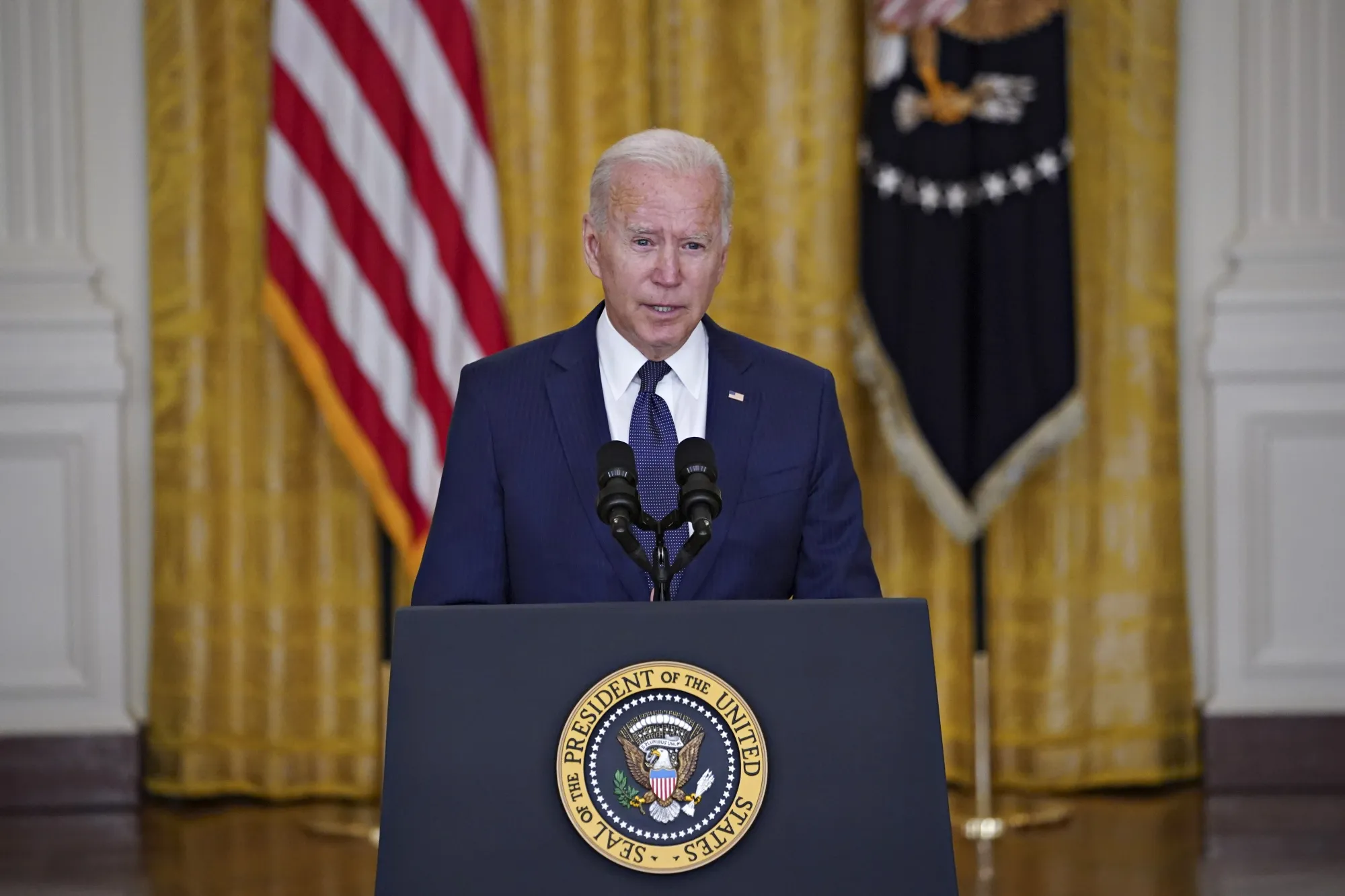 President Biden speaks in the East Room of the White House on Aug. 26.