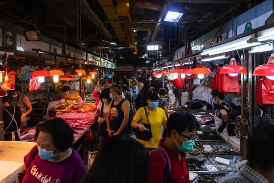 Hong Kong Faces Worst Wave of Virus, But It Can’t Lock Down