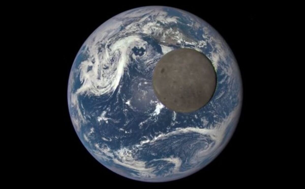A Satellite Sees the 'Dark Side' of the Moon Crossing Earth
