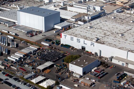 How Tesla Fought to Keep Its Plant Open in a Locked-Down City